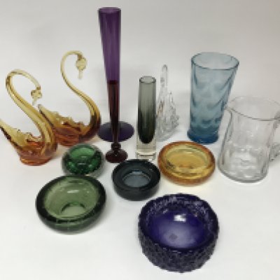 A mixed collection of glassware including cut and coloured pieces.