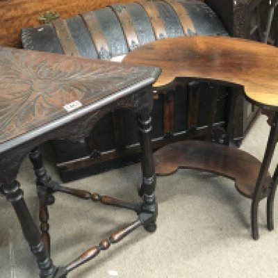 An Edwardian rosewood occasional table with a shaped top on splayed legs United by an under-tier and a carved oak occasional table (2). NO RESERVE