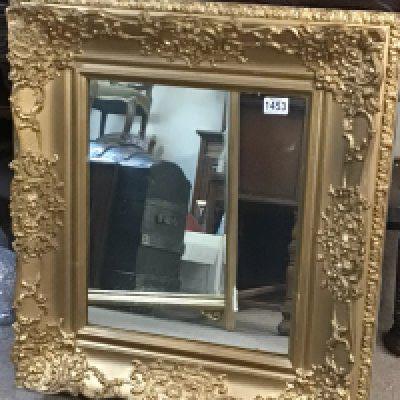 A gilt framed wall mirror of rectangular shape 74x64cm. NO RESERVE