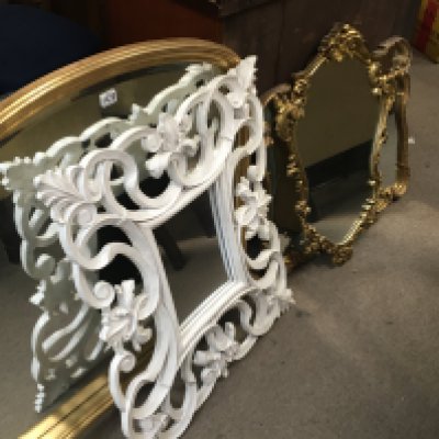 A set of four gilt framed and white painted wood mirror with shaped frames including an overmantel mirror (4). NO RESERVE