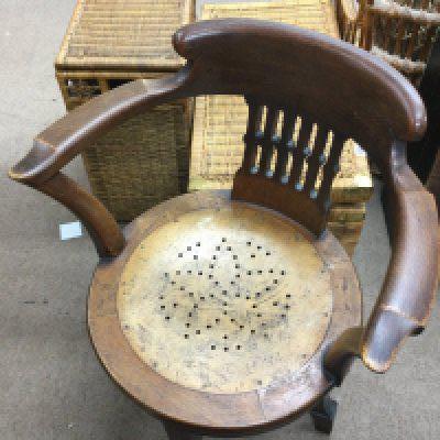 An oak early 20th century open arm chair , 83cm tall, 63cm wide. NO RESERVE