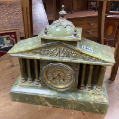 An Onyx and brass classical style mantle clock. Postage not available for this lot. NO RESERVE