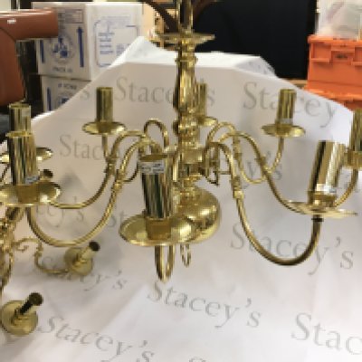 A vintage brass 8 arm searchlight chandelier ceiling pendant and a 5 arm version. Postage D