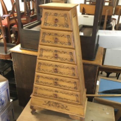A triangular pine collector cabinet with 6 draws. 100cm tall and 52cm at widest point. No reserve Postage D
