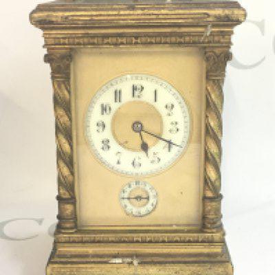 A late 19th century brass carriage clock with repeat strike movement. No key. In need of restoration. Dimensions 9.5x11x16.5cm This lot cannot be posted