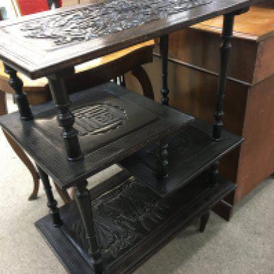 An oriental hardwood carved open display shelf with four tiers of rectangular shape good condition. 59cm wide height 84cm