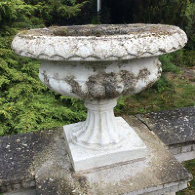 A set of Seven composition, concrete garden, ornaments in the form of classical urns these are cemented to a balustrade, but will come off quite easily sold in situ buyer to collect. Height 39cm