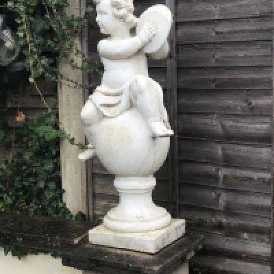 a composition, concrete neoclassical style garden, ornaments in the form of a putti playing tambourines. Hight 100cm