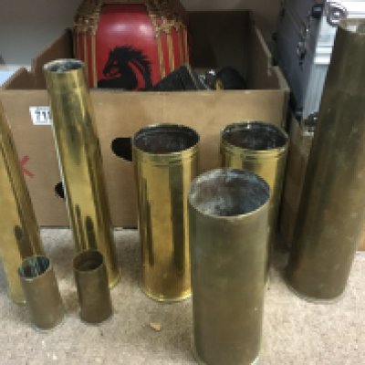 A Collection of shell cases including some WW1 examples. Tallest shell 35cm. Postage category C