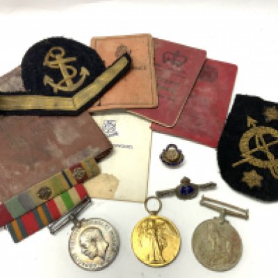 A pair of WW1 medals awarded to 93852 GNR J A JENNINGS. R.A together with an additional WW2 medal, Papers and badges etc.. (B)