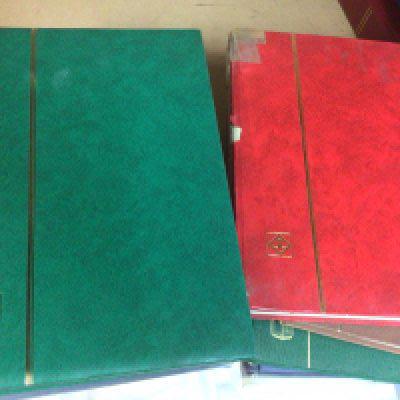 A collection of 11 albums of mint / used world postage stamps. NO RESERVE