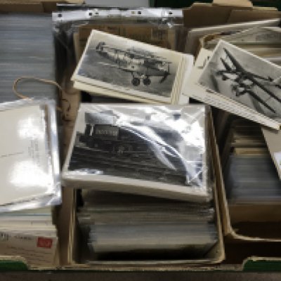 A box containing postcards a large Vintage Judges British landscapes and monuments photos of steam trains Vintage Aircraft and many other cards