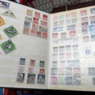 A collection of stamp albums mainly world stamps and first day covers