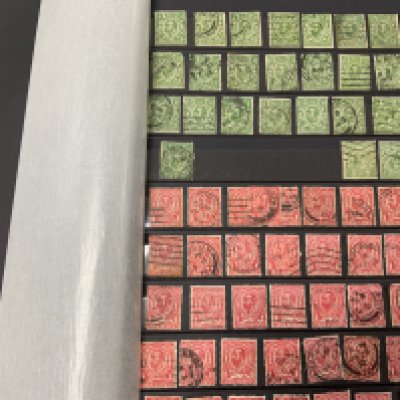 An Album of George V postmarked stamps various value.