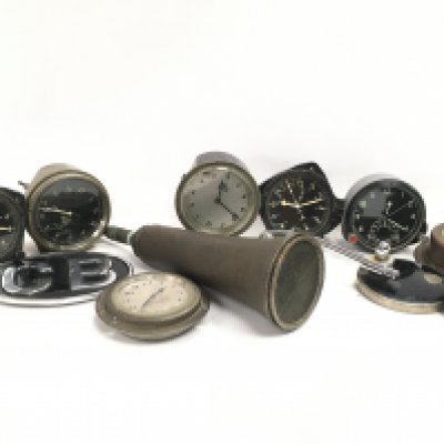 A Collection of aircraft and car clocks including Smiths and a Russian example, a vintage car horn, GB badge, vintage Lucas King of the Road car mirror. This lot cannot be posted