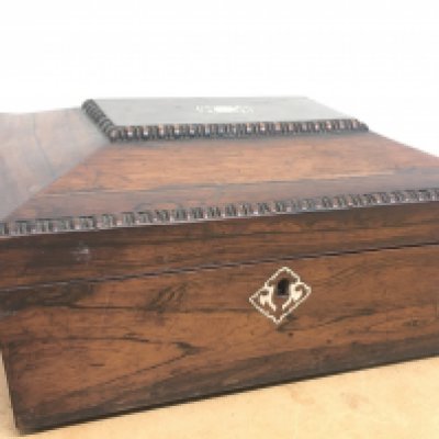 A Victorian rosewood box with inlaid mother of Pearl decoration ,dimensions 28x21x15cm