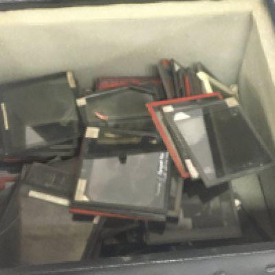 A collection of lantern slides Newton & Co Fleet Street London Middle Eastern and Oriental scenes. With a vintage brass and painted metal projector. NO RESERVE