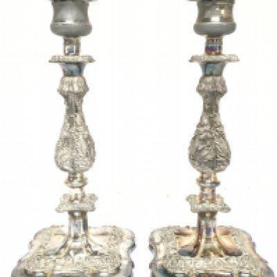 A pair of silver plated candle sticks, 30cm tall approximately. Postage category C