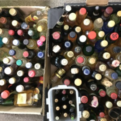 A collection of miniature spirits including Latte Di Suocera, Langs Scotch, Old Forester, Talisker, Oban, Glen Turret etc. Variating levels. This lot cannot be posted