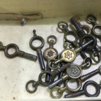A collection of pocket watch keys. Postage category A