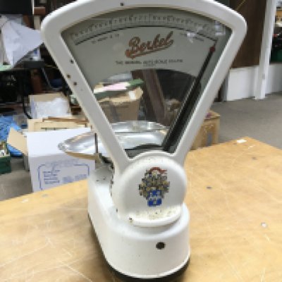 A vintage set of Berkel shop scales. Postage D