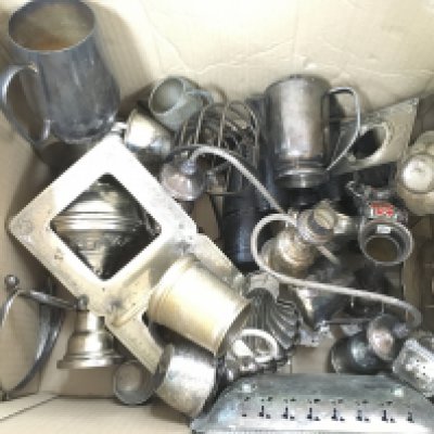 A large box of assorted silver plate and other metal items.