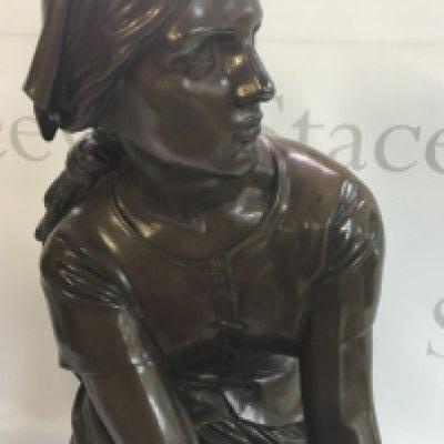 A bronze figure in the form of a maiden kneeling with clasped hands .signed Chapu . 46 cm