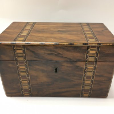 An Edwardian teacaddy. 23cm wide 12cm deep and 13cm tall.Postage B