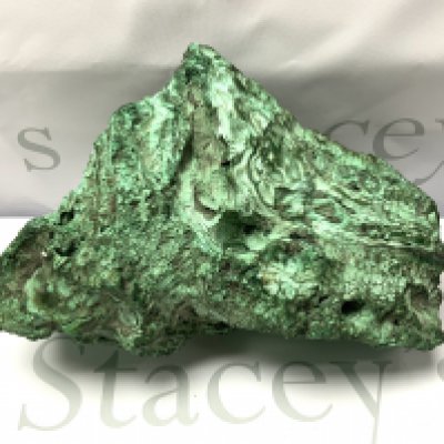 A large natural Zambian Malachite specimen in the form of a Dragons head, 28cm x 21cm, 4.74kg.