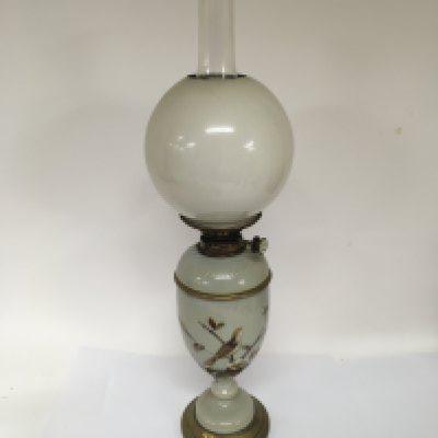 A Victorian opaque glass and enamel decorated oil lamp with an opaque shade and glass chimney. NO RESERVE
