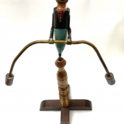 A vintage novelty folk art balancing strongman, 50cm.