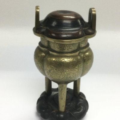 A bronzed censor with a carved hardwood lid and stand, total height approx 14cm. Shipping category B.