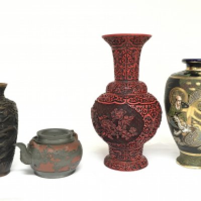 A Collection of Chinese and Japanese vases including a carved red lacquer Chinese vase, Japanese Satsuma vase, Yixing red clay dragon tea pot etc. this lot cannot be posted
