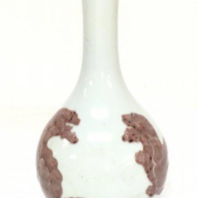 A Chinese Buddhist lions porcelain vase. 23.5cm tall approximately. No obvious large damage or restoration. This lot cannot be posted