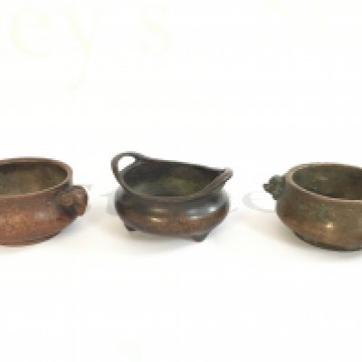 A collection of Chinese bronze censers, 8cm wide approx. Postage category B