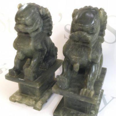 A pair of Chinese jade lion dogs , 19cm tall. This lot cannot be posted