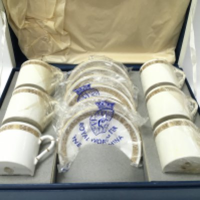 A boxed Royal Worcester coffee set. Postage D