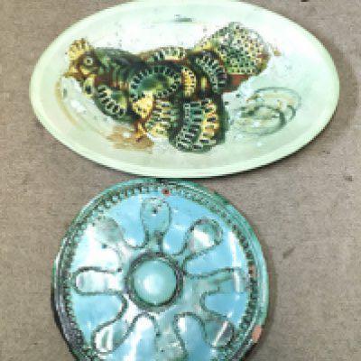 Two art dishes including an oval ceramic cockerel design dish and a Turquoise wall dish. This lot cannot be posted