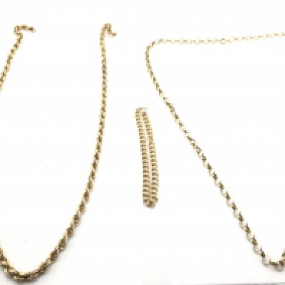 9 carat gold chains, total weight 33.2g. Postage category a