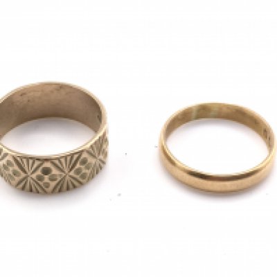 A 22ct wedding band (4g) and a 9ct engraved band (5.2g). Size R. Postage category a