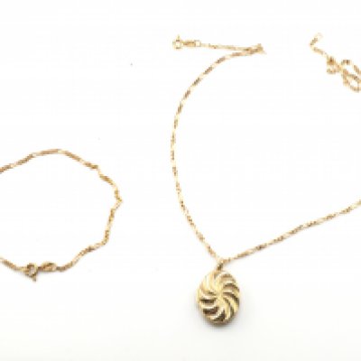 A 9 carat gold bracelet and a 9 carat gold chain with locket , 6.4g total weight. Postage category a