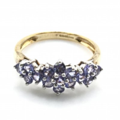 A 9 carat gold tanzanite set ring, size N, 2.1g. Postage category a