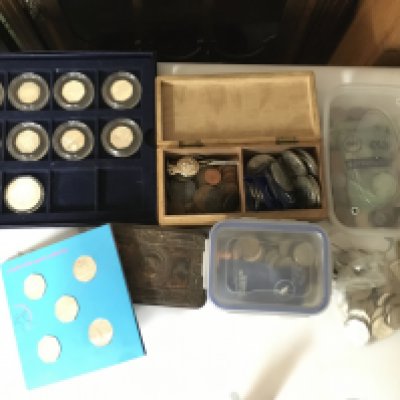 A collection of mixed British coins including 50p coins. Postage category C