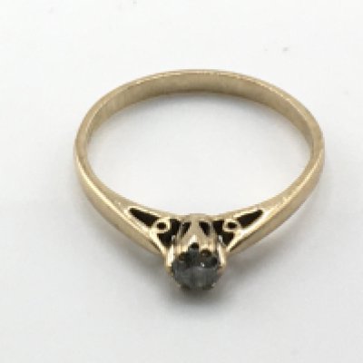 A 9ct gold ring set with a diamond solitaire approximately 0.15 size Q and 1.8g