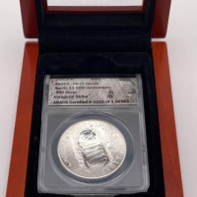 2019 Apollo 11 50th Anniversary fine silver commemorative coin. (A)