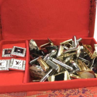 A collection of Cufflinks and tie pins. Postage category a