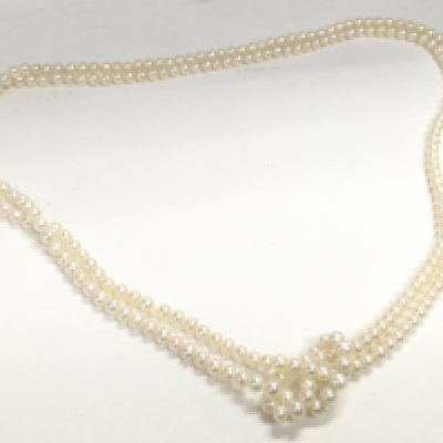 A long cultured fresh pearl necklace, postage category a