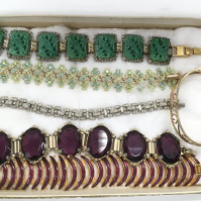 A collection of vintage costume jewellery bracelets. Postage category a