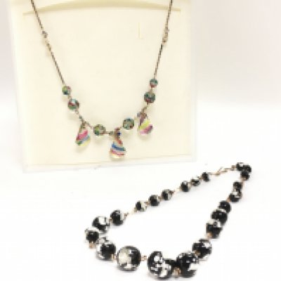 A rainbow glass necklace and a rolled gold necklace