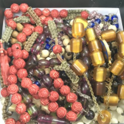 A collection of Rosaries , postage category a